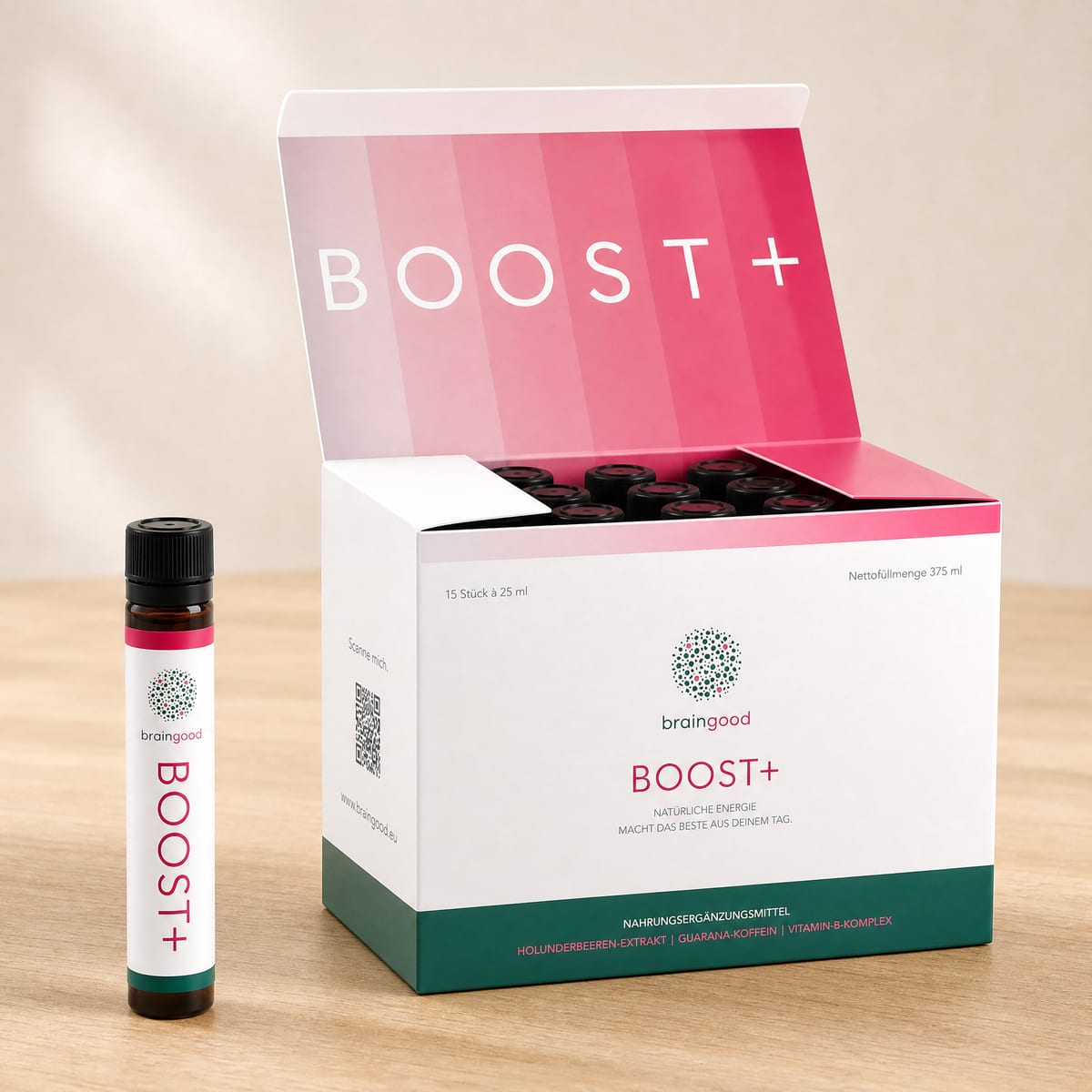 Geöffnete BOOST+ Box mit Ampulle davor